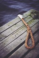 rope on a wooden pier