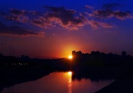 bright sunset over the river in sao paulo