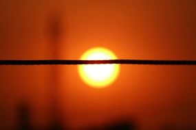 rope against the background of a bright sunset