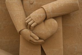 hands sand art sculpture