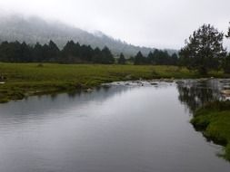 water flow in the valley of the mountains