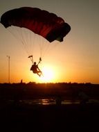 parachute in golden sunset light scene