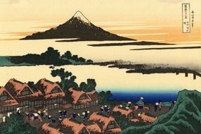 painted village on the background of Mount Fuji in Japan