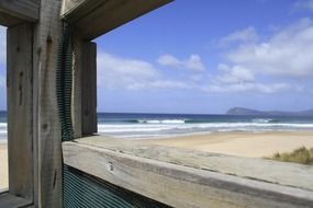 empty quiet beach in tasmania