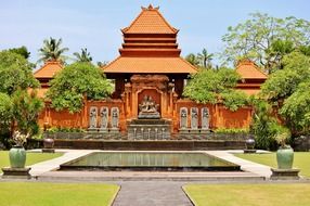 tropical island scene with traditional building