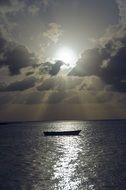 empty boat is sailing in the open sea