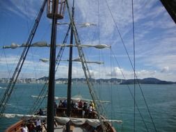 people on a sailing ship at sea