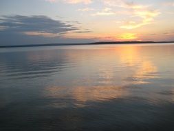 reflection of the setting sun in the lake