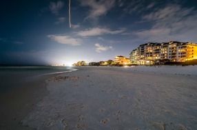 panoramic view of the ocean coast at night