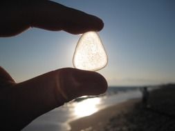 sun stone shadow hand back light