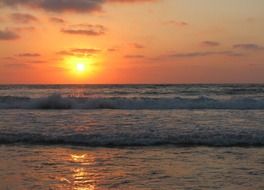 reflection of the golden sun in the ocean