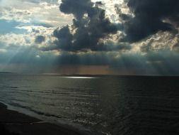 seascape of sea and dark clouds in the evening