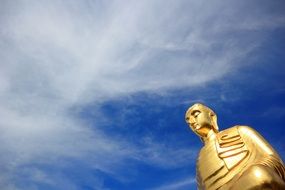 Golden statue and blue sky