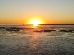 bright light of the setting sun