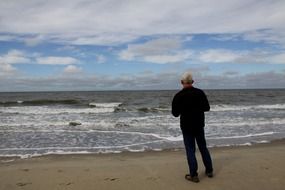 landscape of standing man on a beach