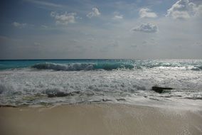 Wavy ocean beach in Cancun
