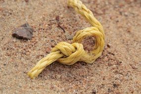 yellow rope on the beach close-up