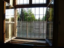 window with bars in auschvitz birkenau