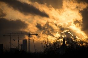 construction site on a background of gloomy sunset