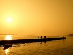 Golden landscape pier at sunset