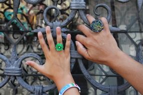 mother's hands and daughter with rings
