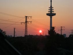 landscape of the power lines at the gorgeous evening sunset