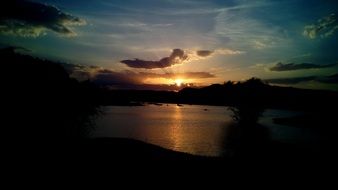 romantic magnificent orange sunset reservoir reflection