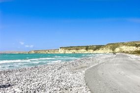 bright blue seawaters at the coastline on cyprus