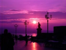 purple sunset over the seafront in Pizzo