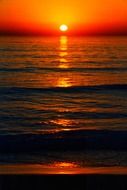 bright sunset evening sea waves
