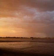 rose-golden sunset after storm