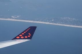 view of the wing of an airplane in flight