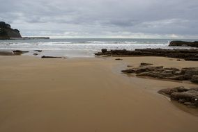 peaceful beach at cloudy day