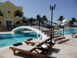 hotel with swimming pool and bridge relaxing scene