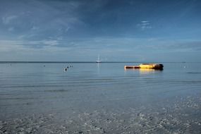 dinghy is on the sea water at sunrise