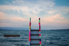 ladder to descend into the ocean