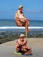 jugglers on the beach on a sunny day