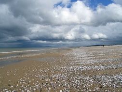 Lonely beach under the clouds