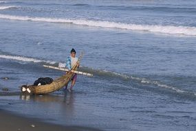 fisherman on the beach in peru