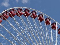 ferris wheel with red cabins