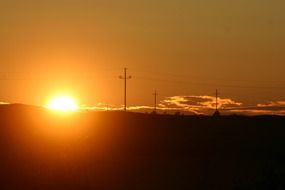 orange sunset glow in dark twilight landscape