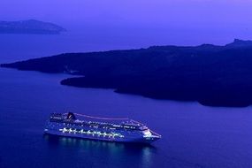panorama of a cruise ship in the night lights