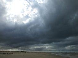 gloomy clouds over the beach