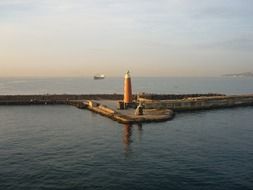 panorama of the lighthouse near the entrance to the harbor