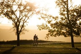 Humans walking on a Lakeside