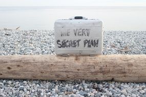 the very secret plan on a beach