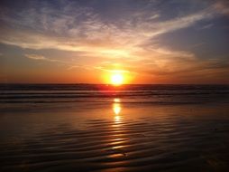 ocean beach at romantic sunset