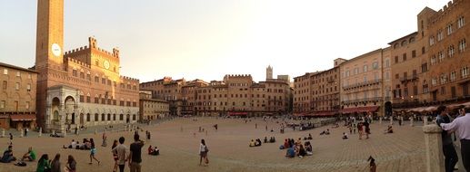 crowded square in siena tuscany panorama