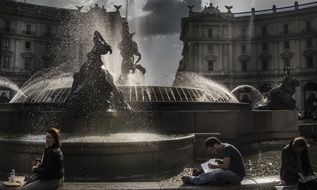 beautiful fountain on the street in rome