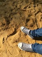 feet on sand beach